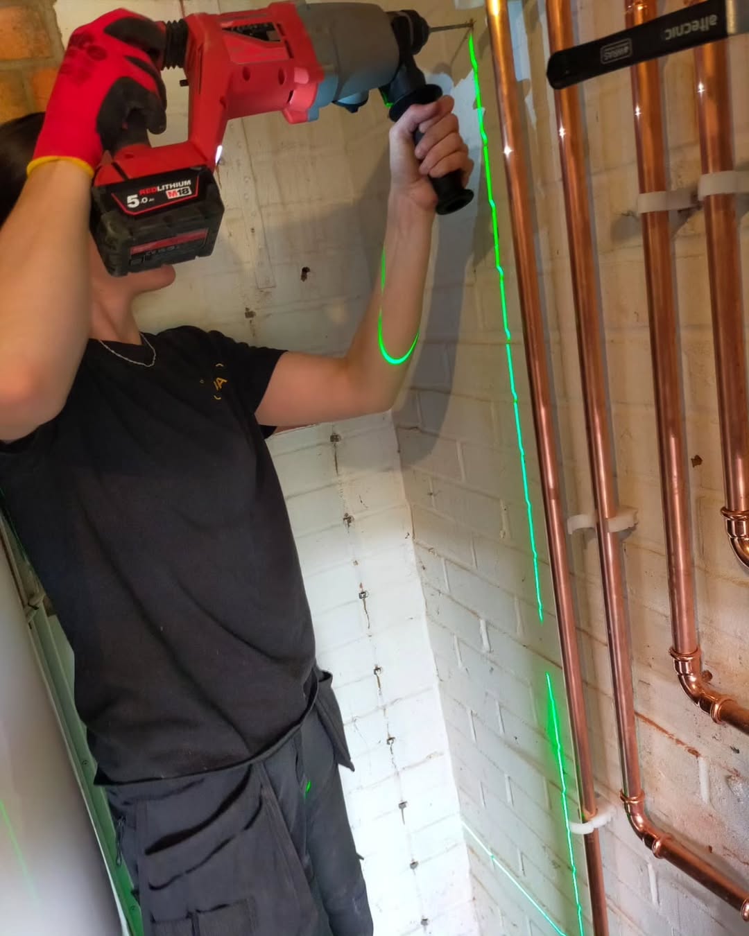 Shauna working on copper pipework